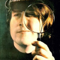 Lennon as Sherlock Holmes