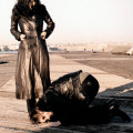 john kneeling before yoko