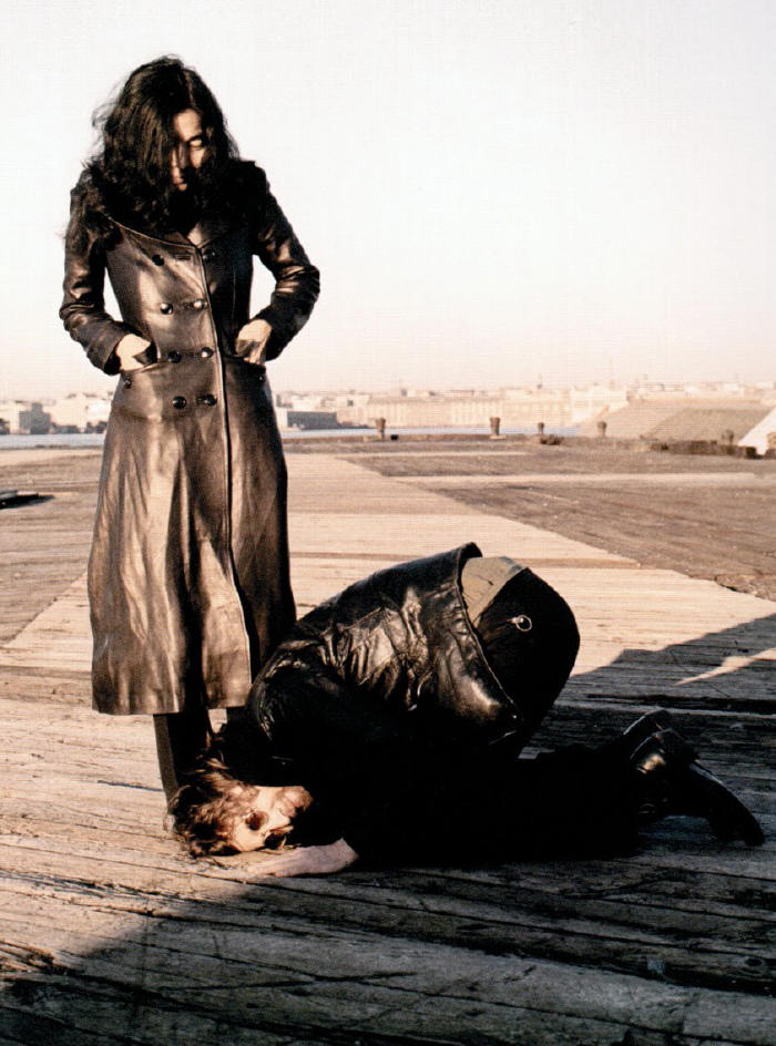 john kneeling before yoko