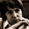 Brown tinted photo of Paul McCartney