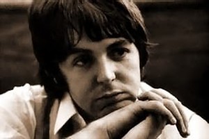 Brown tinted photo of Paul McCartney