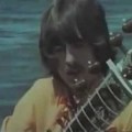 George playing sitar with Ravi Shankar in 1968