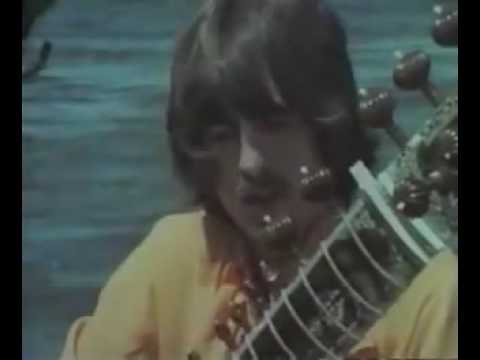 George playing sitar with Ravi Shankar in 1968