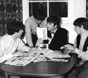 Beatles reading fan mail, including a card reading "S E X."